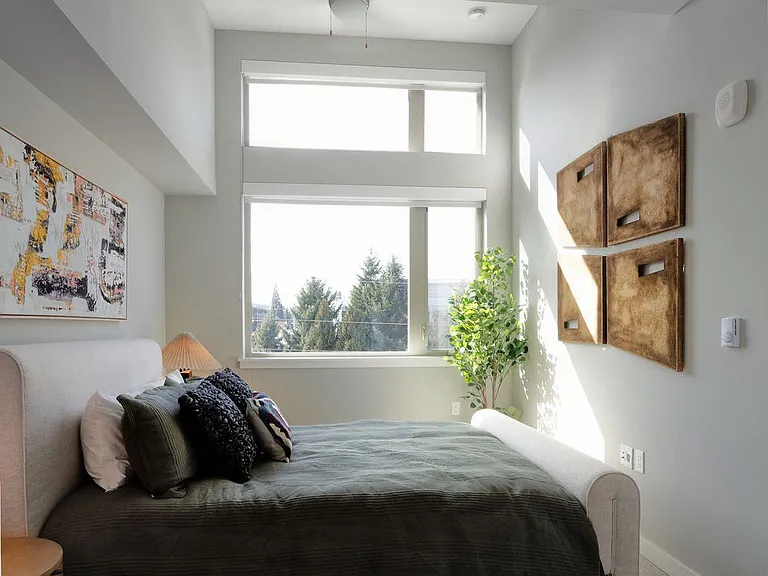 Secondary bedroom with extra tall windows for natural light