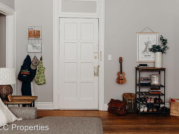 Large living room, hallway on left leads to bedroom