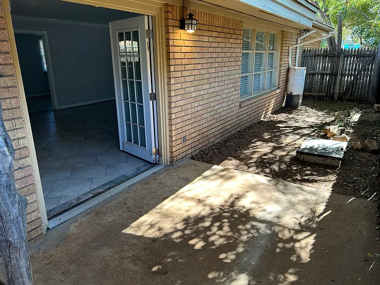 Back porch and rain water collection system.