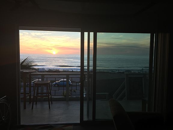 Ocean front view from living room and kitchen area