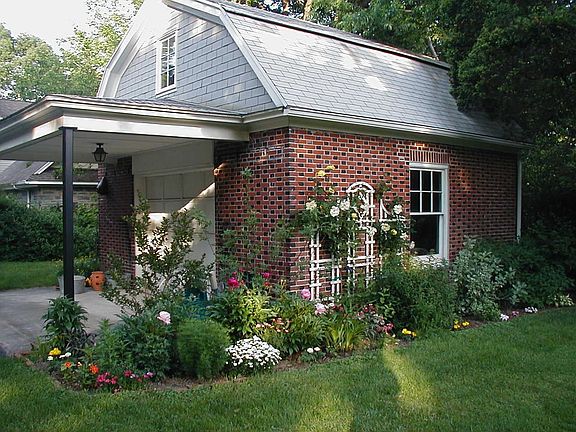 garage with summer garden