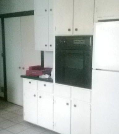 kitchen pantry, oven, refrigerator