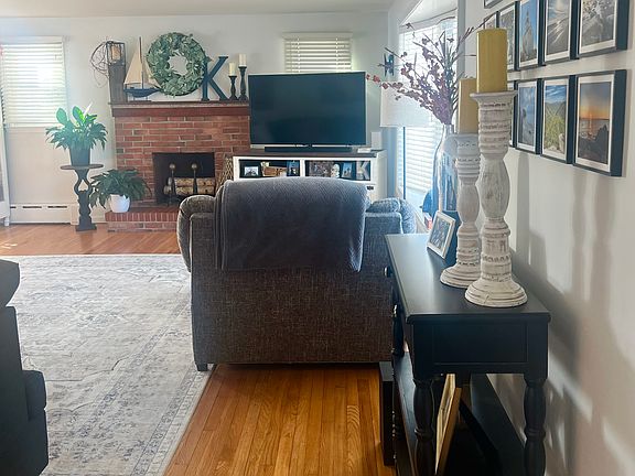 Decorative fireplace and plenty of space in the living room for multiple seating areas
*Note: decorative fireplace