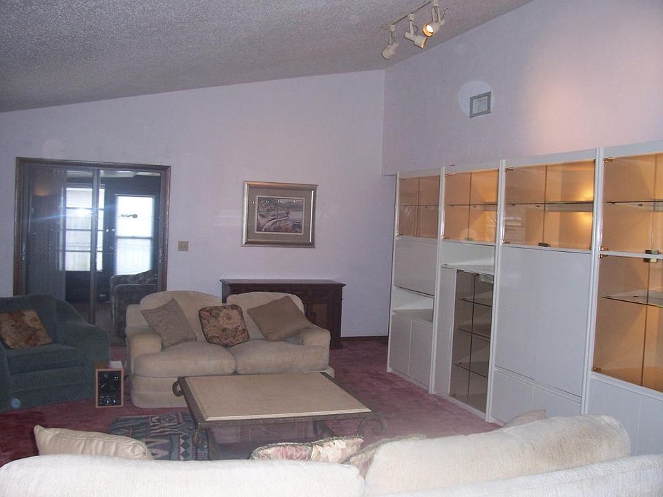 Great room with cathedral ceilings this is the other side of