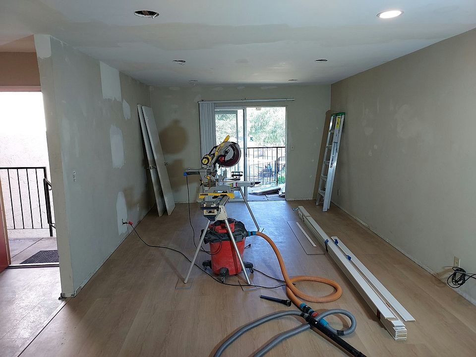 Remodel in progress. NEW floor and recessed lights installed. Baseboards and paint next.