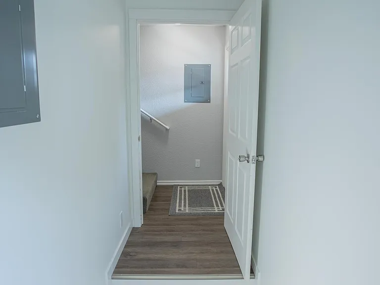 Hallway to Upstairs Apartment Unit.