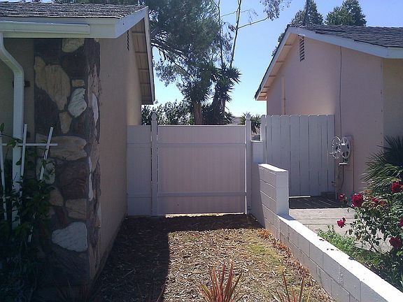 VINYL FENCE. ATTIC FAN.