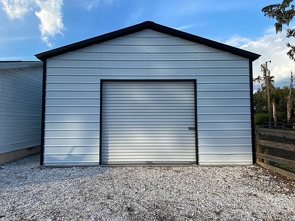 Detached barn garage with ample storage space