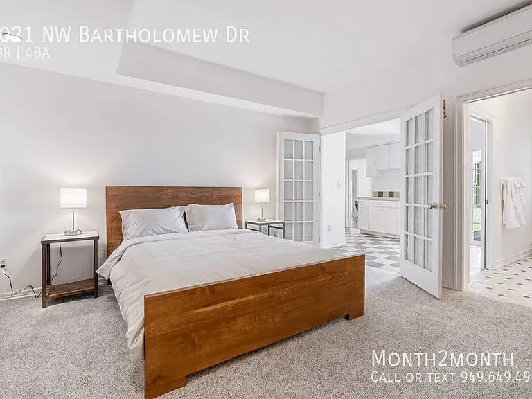 9021 NW Bartholomew Dr — Photo 5