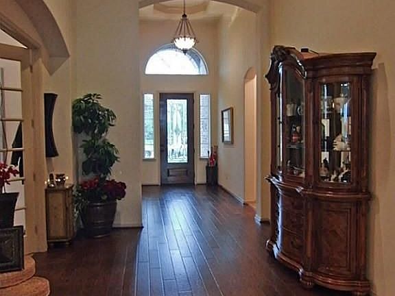 Warm & Welcoming Foyer * Gleaming Wood Floors * Note The Trayed Ceiling