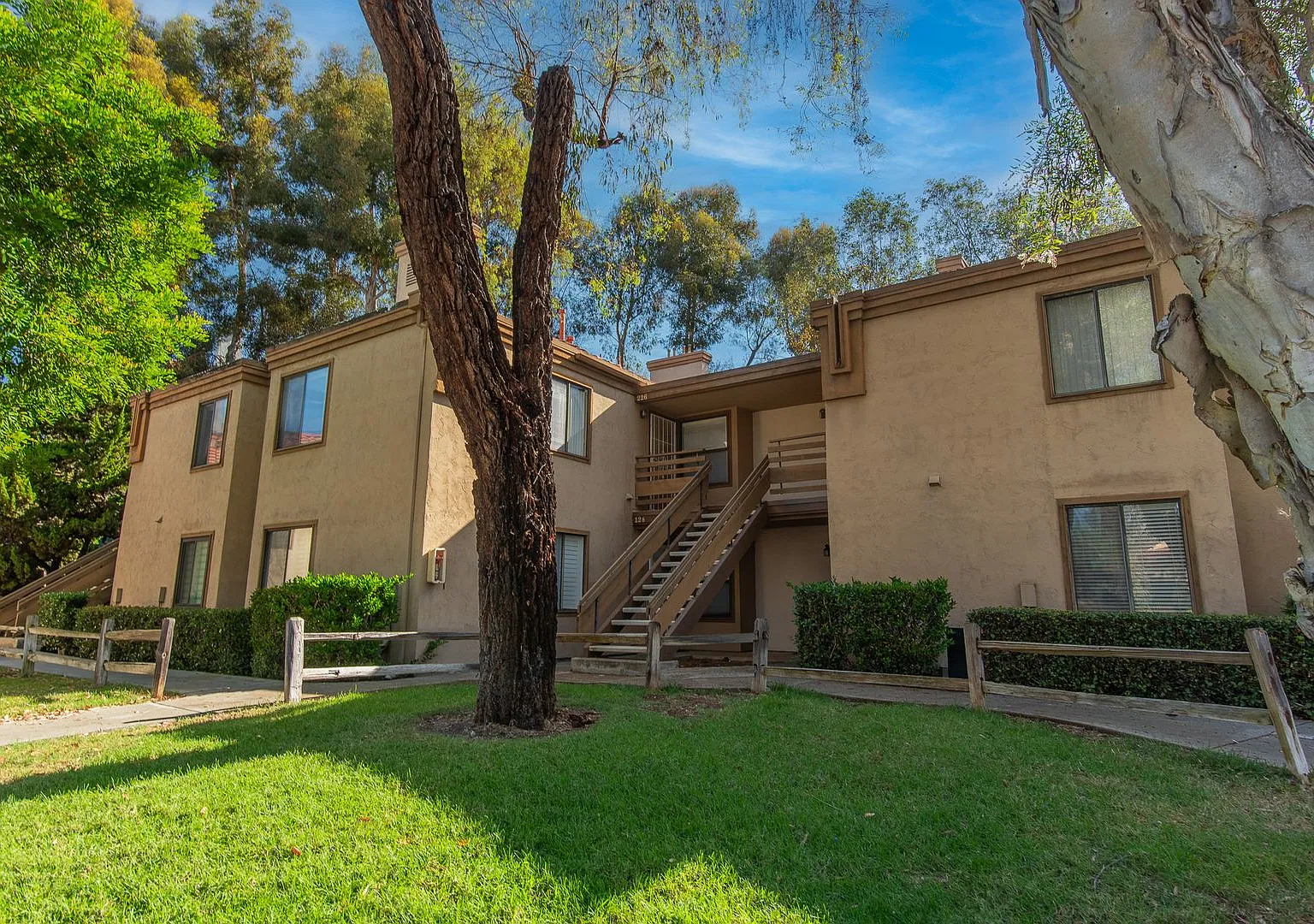 Top-Floor Living: Vaulted Ceilings, Balcony, A/C & Community Pool — Photo 1