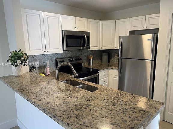 4th image of 6015 NW 116th Pl APT 464