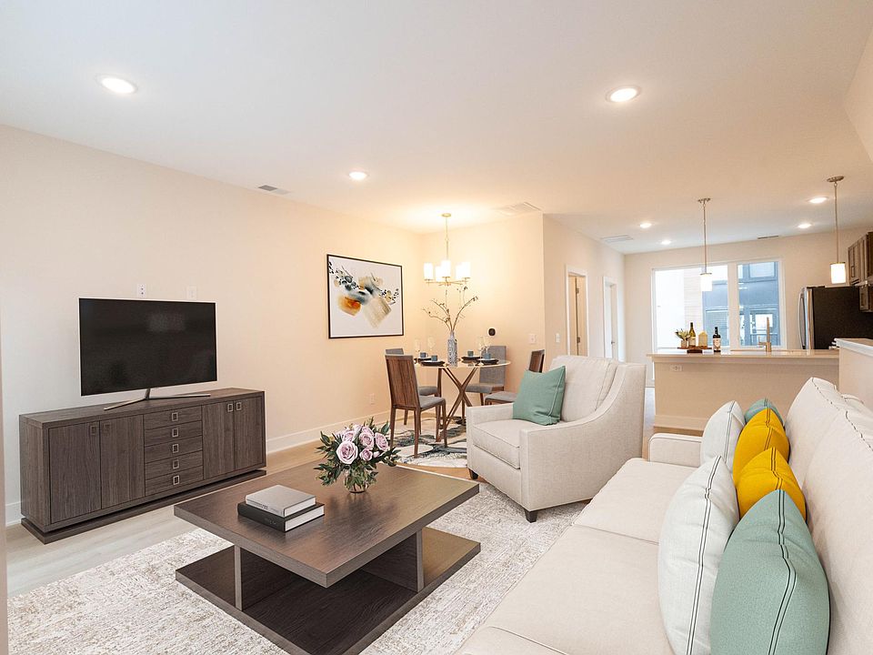 Beautiful open and bright living room with lots of natural light.