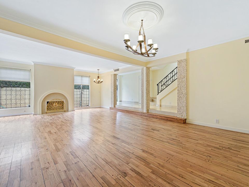 living room and dining area looking out onto front patio
