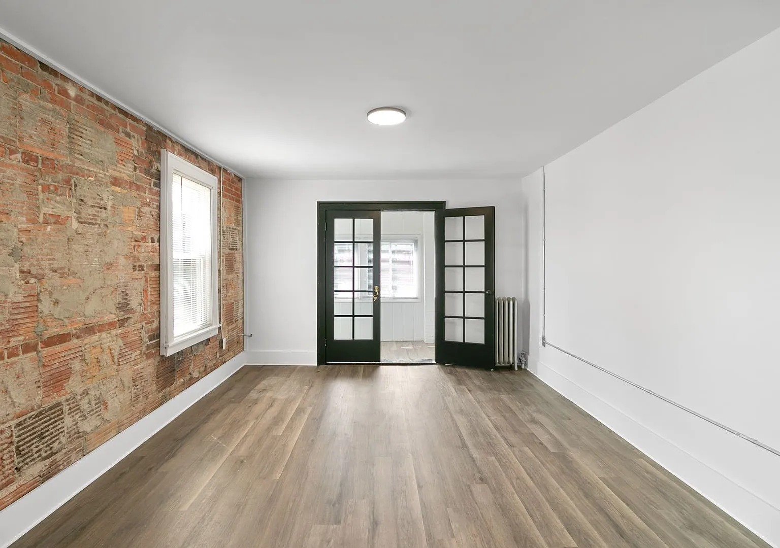 Third Floor Two Bedroom Unit Available — Photo 2
