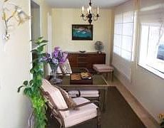Relax in this 3-Season Room/Enclosed Porch