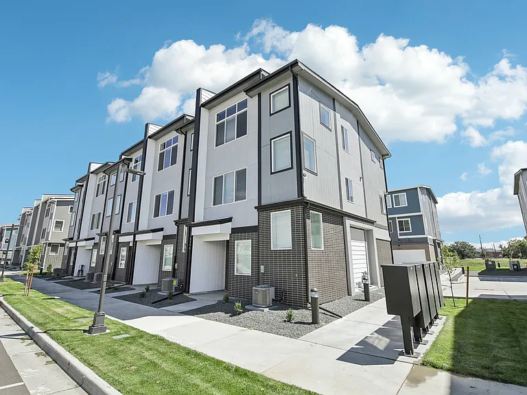 The Rowhomes at Greyhound Park — Photo 1