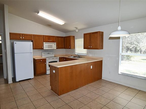 4th image of 6772 Olin Ln