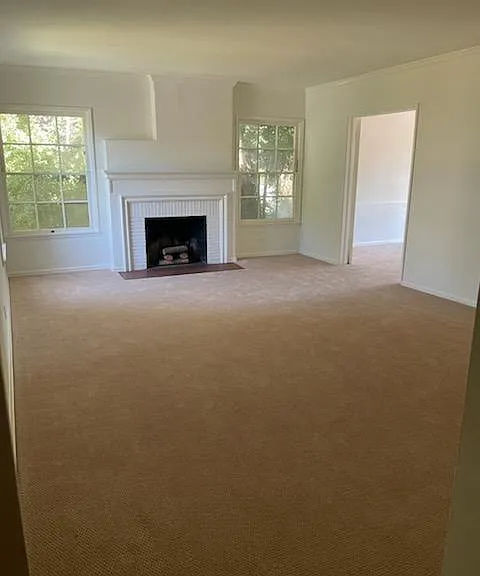 Living room w/wood burning Fireplace