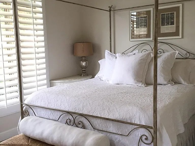 Lovely front guest room with gorgeous canopy King size bed.