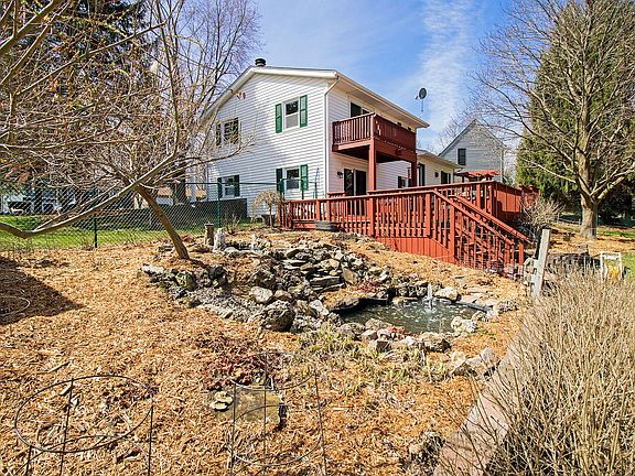 ~ Enjoy this amazing backyard including 2 ponds!