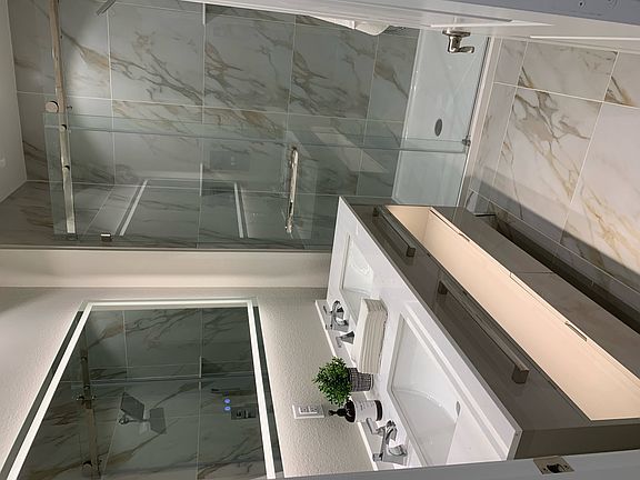 Dual Vanity Bathroom with Lighted Mirror