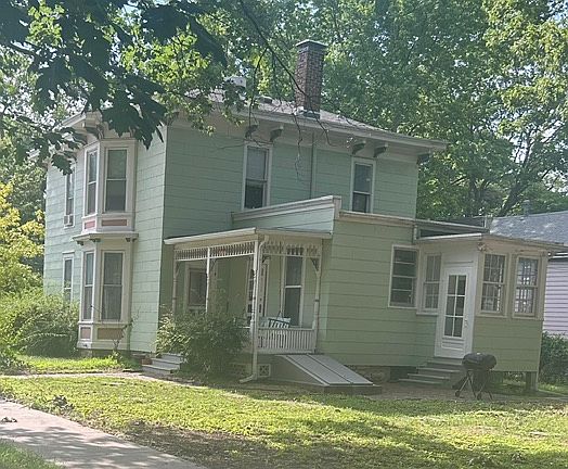 East side of house with lawn