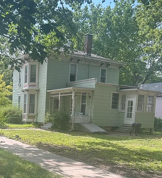 East side of house with lawn
