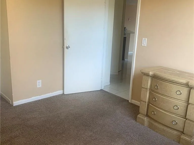 8891 Wiles Rd #308 — Photo 11