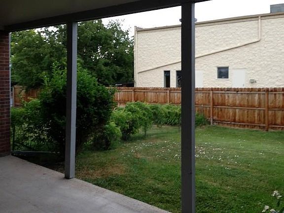 Private fenced backyard.