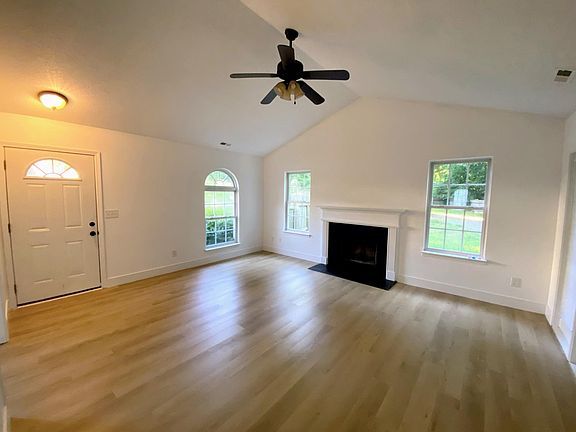 Living room with fresh paint and LVP flooring