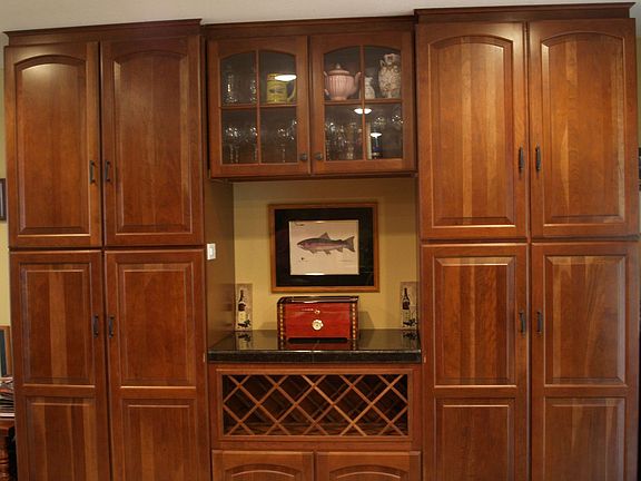 Built-in hutch w/wine rack and roll-out shelves in cupboards