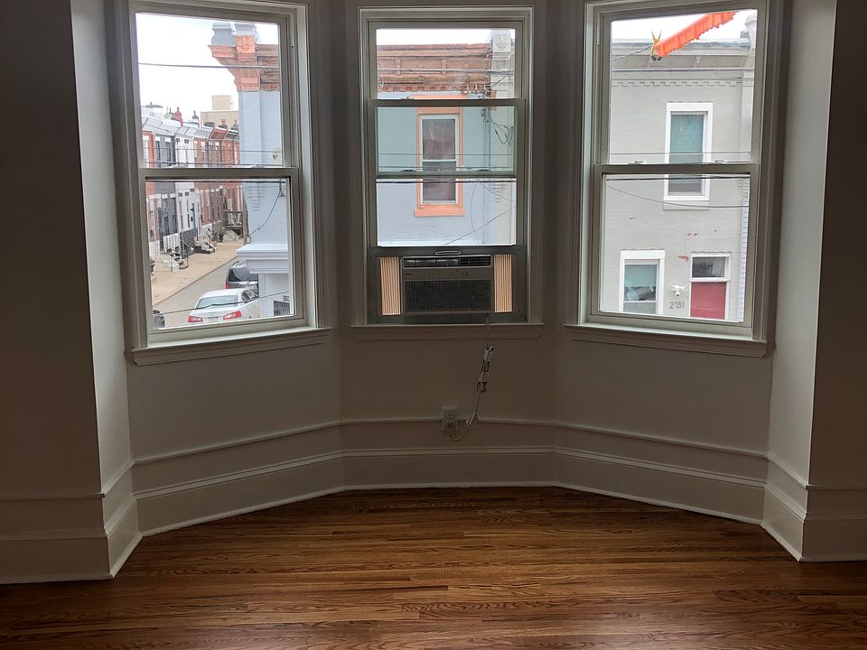 View from Kitchen door leading to a new Bay Window with AC in the Large Spacious Bedroom.