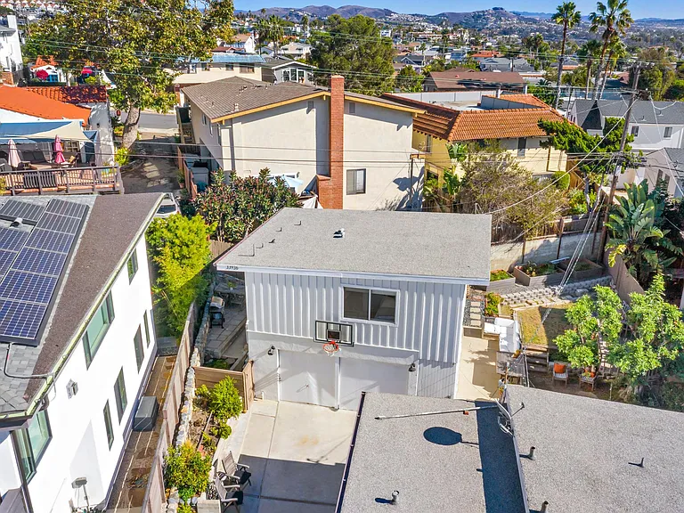 Driveway is gated, plus gate at bottom of stairs of rental home