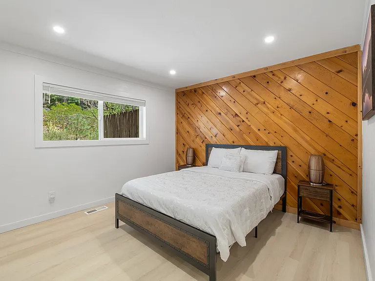 Downstairs Queen of of 4 bedrooms.