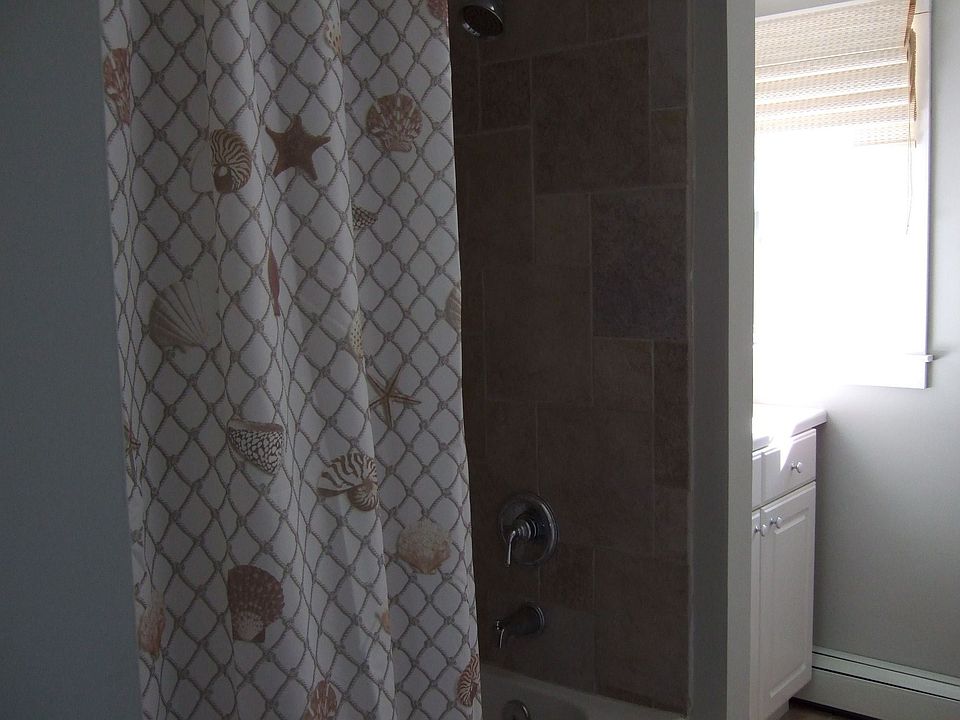 Brand new full bath with tub - upgraded ceramic tile