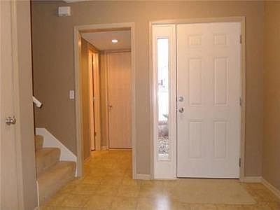 Entryway with Staircase and Bath