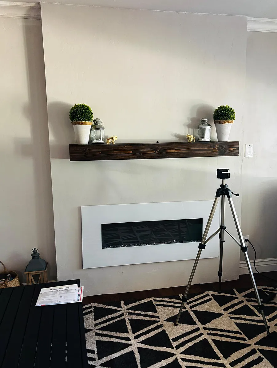 Formal guest seating area with electric fireplace - Rossmoyne Dr