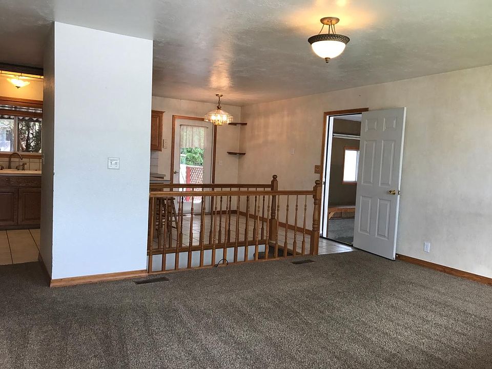 Front living room looking from front door (garage door open on east wall of picture)