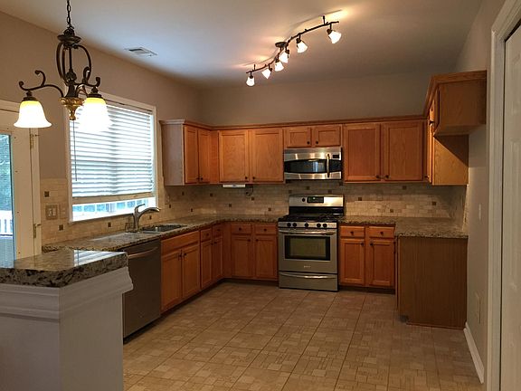 Kitchen ( eat in kitchen, granite counters, tumbled marble b