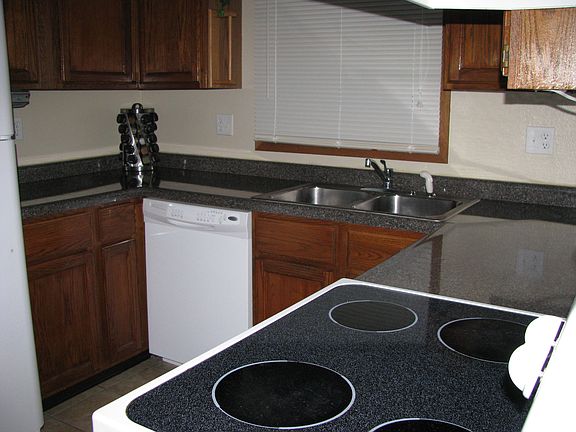 Kitchen with new counter tops and dishwasher