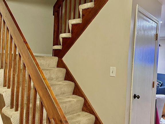 Entryway and stairs to bedrooms