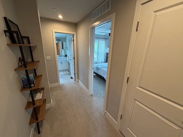Hallway between bedrooms