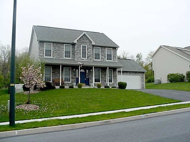Gray stone facade colonial h