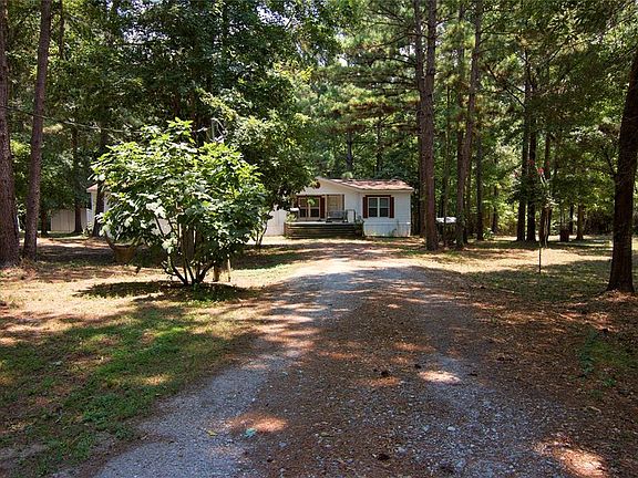 Approximately two acres have been partially cleared in and around the home. The remaining property is wooded and great for hunting.