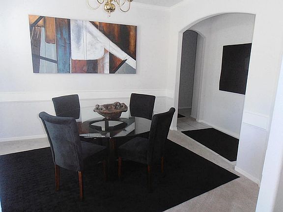 Another view of the living area looking into the back hall.