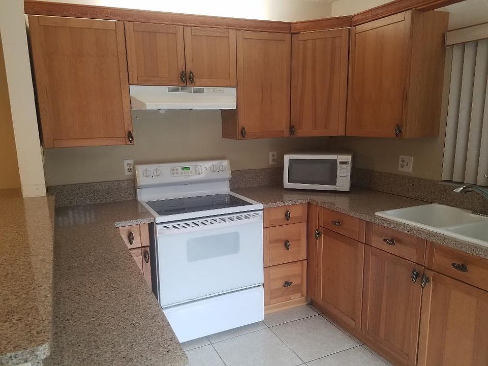 kitchen, stainless DW and Fridge