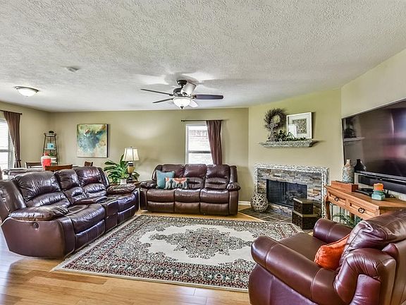 Spacious family room with fireplace.