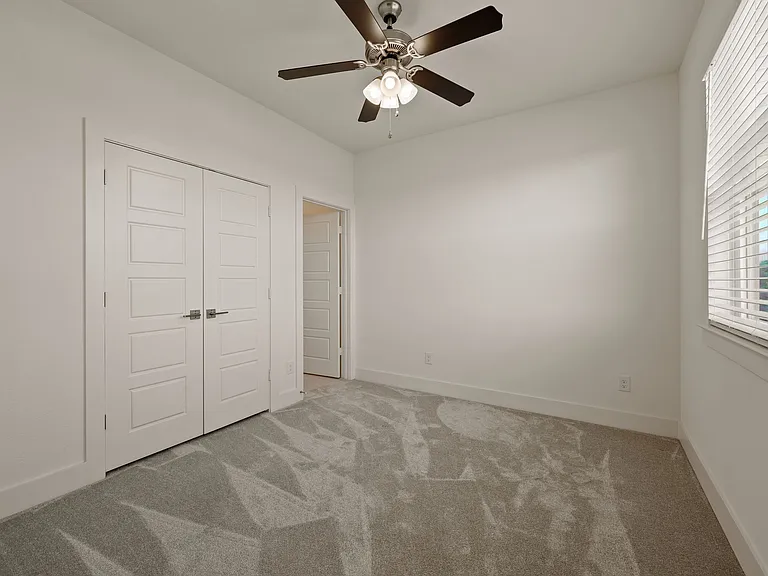 Bedroom #2 with large closet and en suite full bathroom