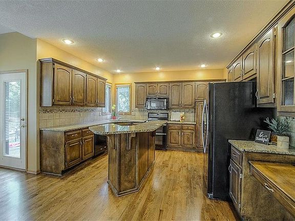 Updated kitchen with granite, double oven, newer appliances!